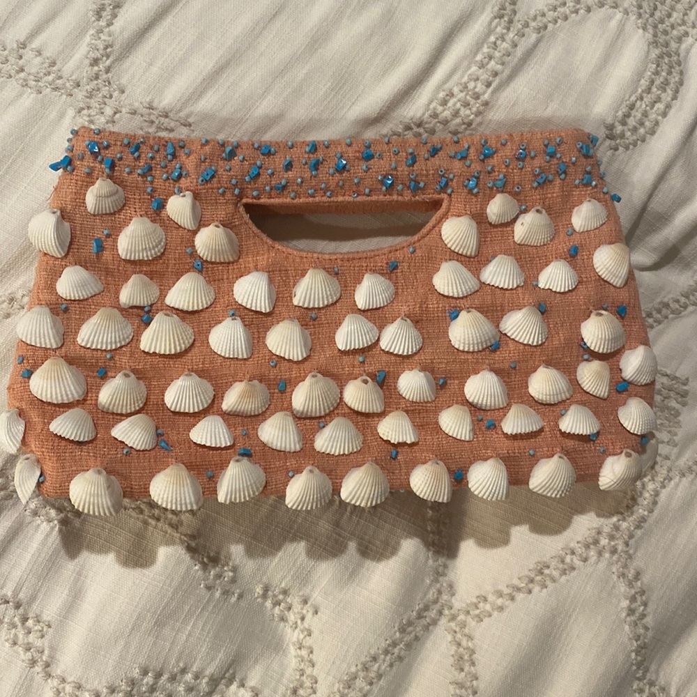 Resort ready! Coral handbag with seashell embellishments